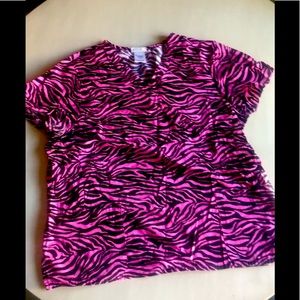 Pink and black zebra striped scrub top